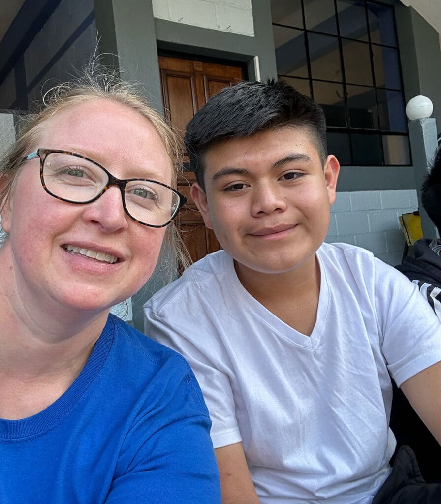 woman team member and young man selfie